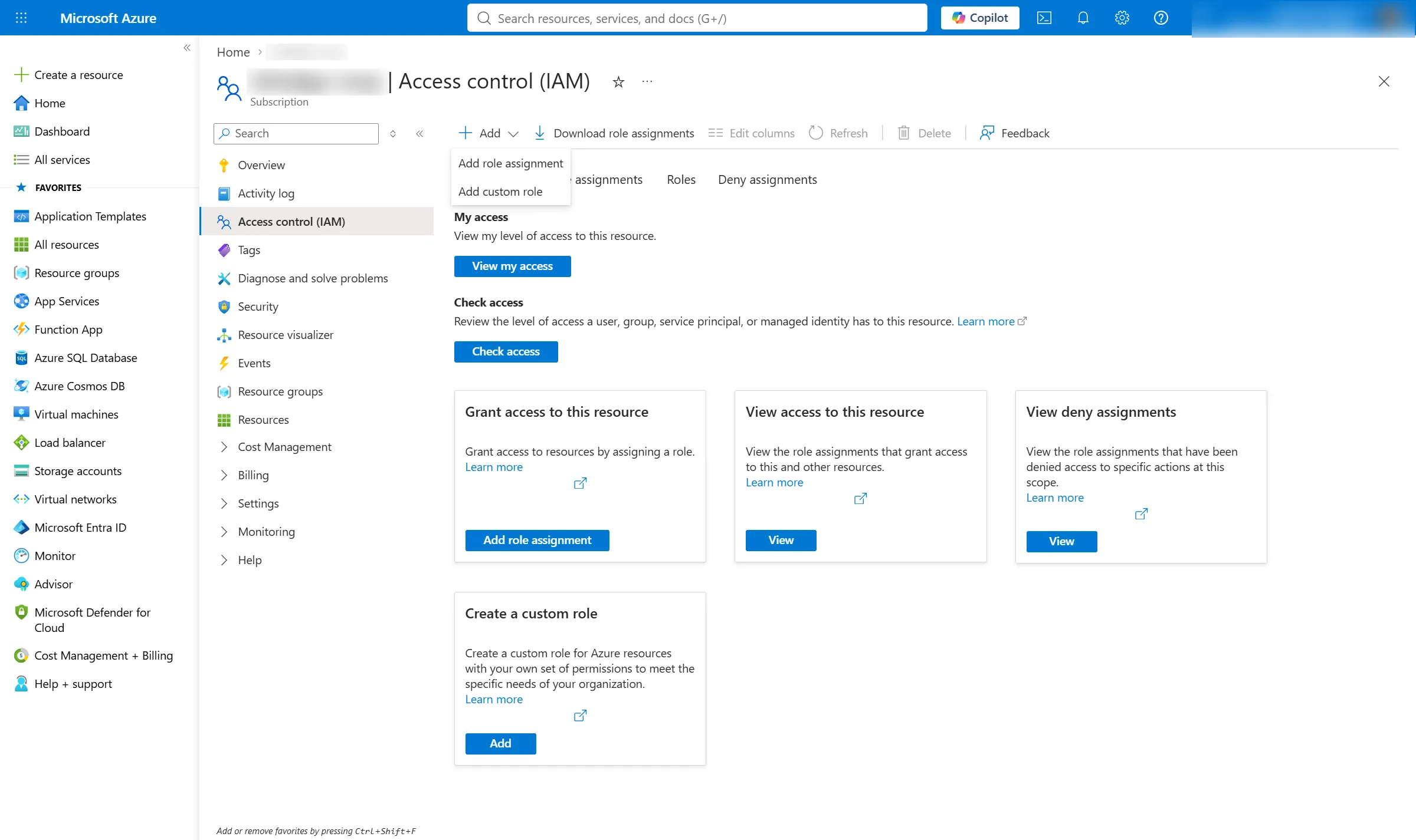 The Access control (IAM) blade of a subscription. The toolbar's Add menu is open with two entries, Add role assignment and Add custom role. Below, cards offer Grant access to this resource, View access to this resource, and View deny assignments.